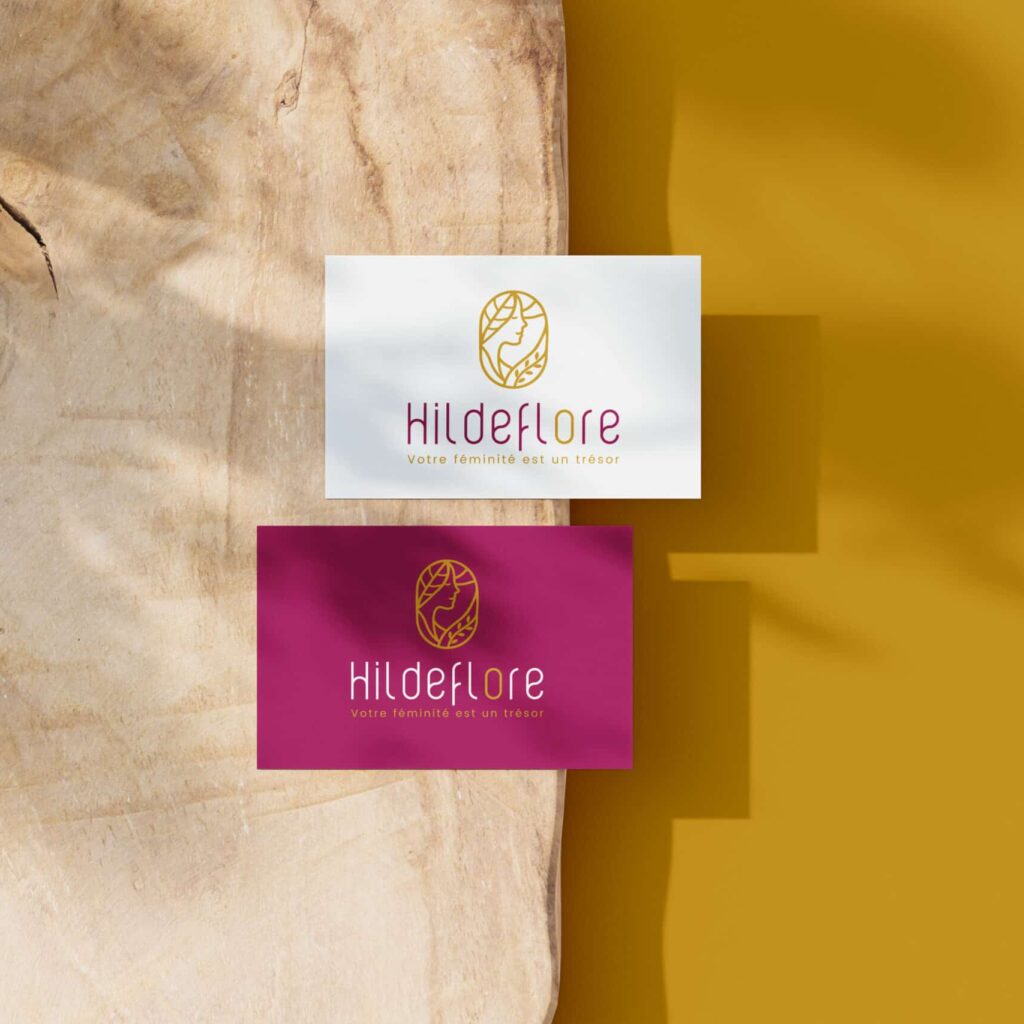Le logo Hildeflore imprimé sur des cartes de visite professionnelles